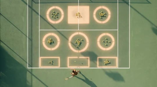 Tennis player practicing precision shots with marked training zones on court